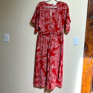 Sienna Sky Tropical Jumpsuit. Color: blood orange. Size:  Medium.